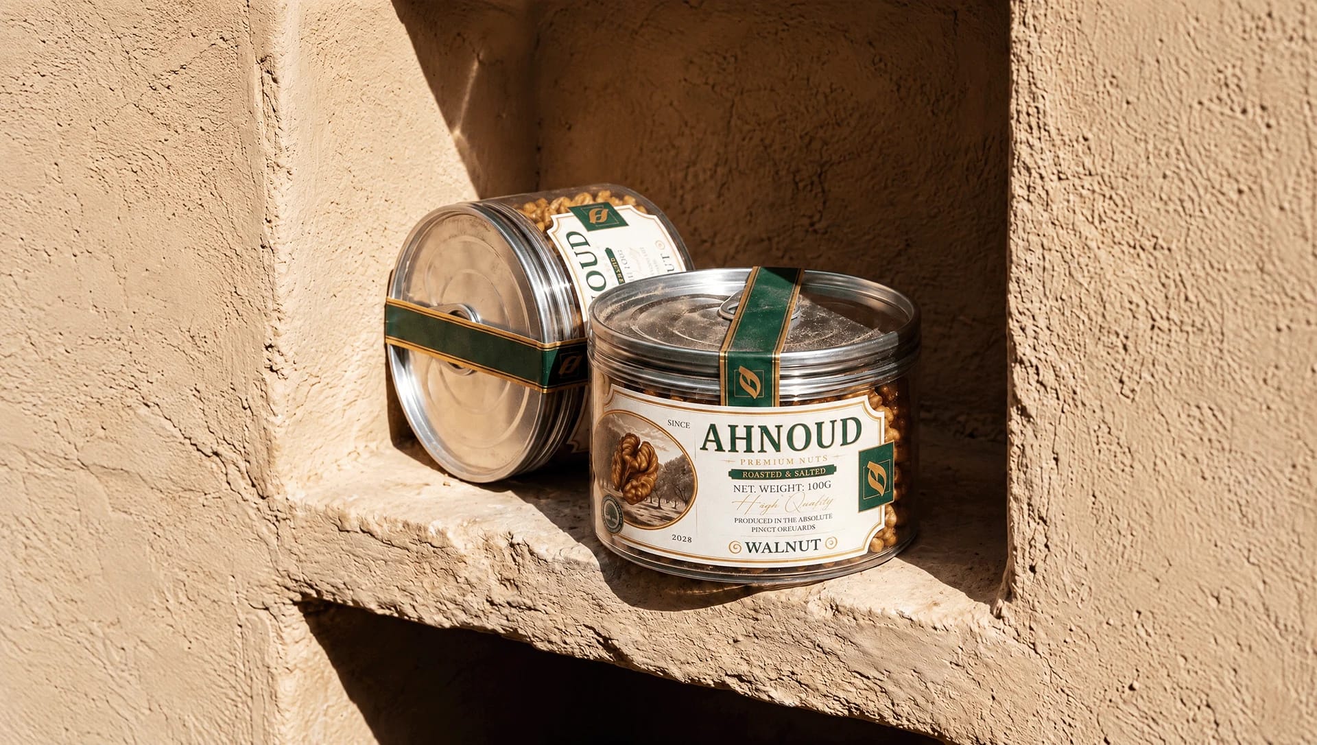 Two Ahnoud walnut cans on a sunlit stone shelf